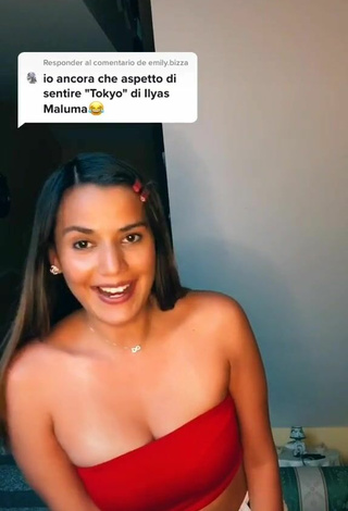 Sultry Nathaly Teran Shows Cleavage in Red Tube Top