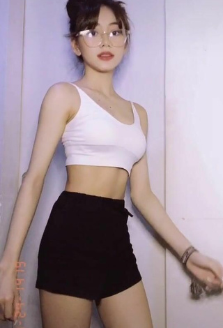 4. Magnetic Paulaxdrea in Appealing White Crop Top