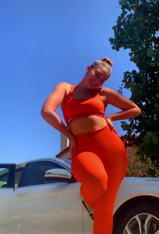 2. Titillating Purplereign77 in Electric Orange Leggings