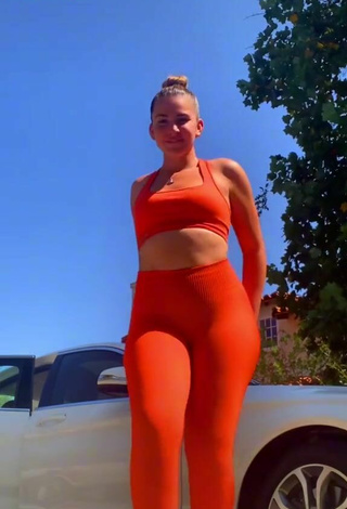 3. Titillating Purplereign77 in Electric Orange Leggings