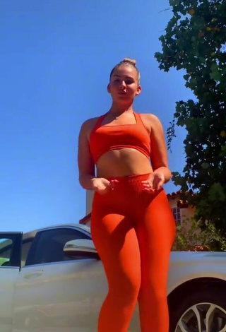 5. Titillating Purplereign77 in Electric Orange Leggings