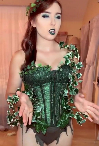 2. Sultry Ari in Green Corset