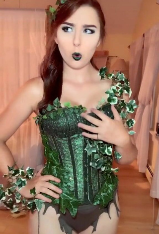 3. Sultry Ari in Green Corset