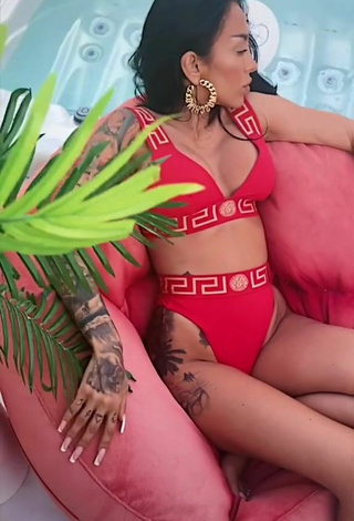 4. Luscious Ruby Shows Cleavage in Red Bikini