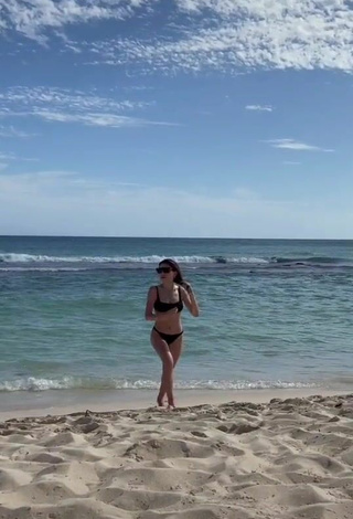 3. Sultry Şeyda Erdoğan Shows Cleavage in Black Bikini at the Beach