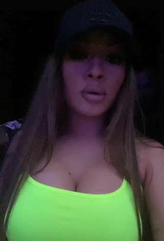 Cute Simonna Braboveanu Shows Cleavage in Lime Green Crop Top