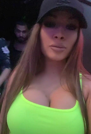 3. Cute Simonna Braboveanu Shows Cleavage in Lime Green Crop Top