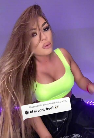 4. Sweetie Simonna Braboveanu Shows Cleavage in Lime Green Crop Top