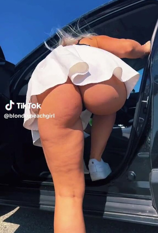 Sexy blonde.peachgirl Shows Butt in a Car (Upskirt)