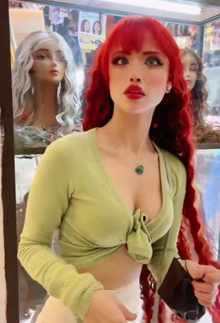 2. Sweet Bella Dueñas Shows Cleavage in Cute Light Green Crop Top