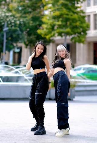 5. Fine Bùi Thảo Ly in Sweet Black Crop Top in a Street