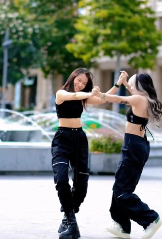 6. Fine Bùi Thảo Ly in Sweet Black Crop Top in a Street