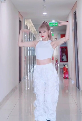 2. Pretty Bùi Thảo Ly in White Crop Top