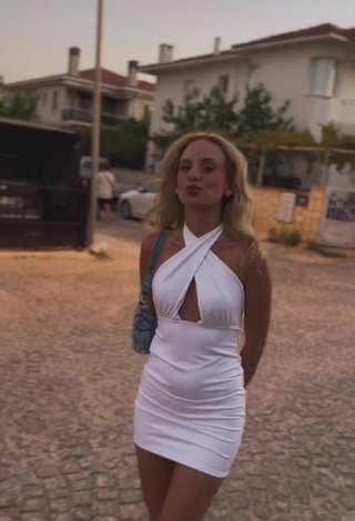 5. Sultry Cemre Solmaz in White Dress (Side Boob)