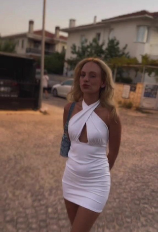 6. Sultry Cemre Solmaz in White Dress (Side Boob)