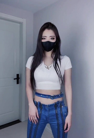 Lovely Han Qui in White Crop Top