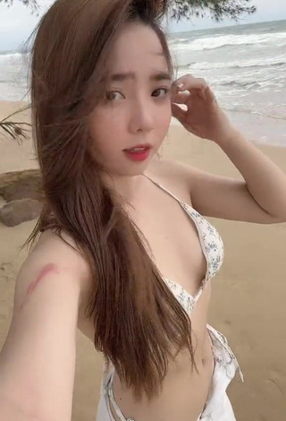 Sultry Cindy Diễm Mii Shows Cleavage in Bikini Top at the Beach (Side Boob)