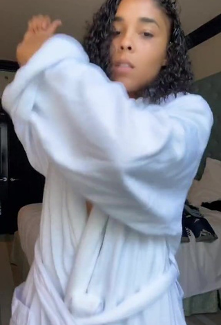 3. Sultry Crissa Jackson Shows Cleavage in White Bathrobe (Side Boob)