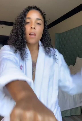 5. Sultry Crissa Jackson Shows Cleavage in White Bathrobe (Side Boob)