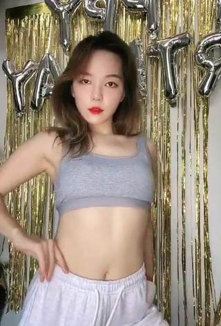 4. Dazzling Dasuri Choi Shows Cleavage in Inviting Grey Crop Top