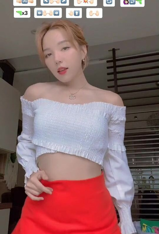 Fine Dasuri Choi Shows Cleavage in Sweet White Crop Top