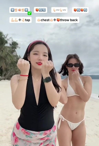 Sultry Dasuri Choi Shows Cleavage in Black Swimsuit at the Beach (Side Boob)