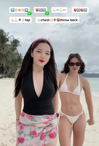 2. Sultry Dasuri Choi Shows Cleavage in Black Swimsuit at the Beach (Side Boob)