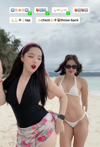 3. Sultry Dasuri Choi Shows Cleavage in Black Swimsuit at the Beach (Side Boob)