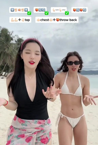 4. Sultry Dasuri Choi Shows Cleavage in Black Swimsuit at the Beach (Side Boob)