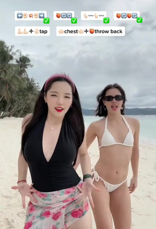 5. Sultry Dasuri Choi Shows Cleavage in Black Swimsuit at the Beach (Side Boob)