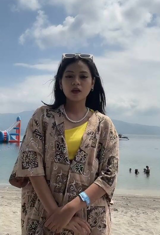 Hot Eya Borja Shows Cleavage in Yellow Bikini