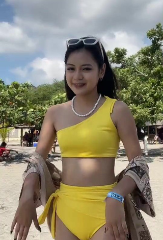 2. Titillating Eya Borja Shows Cleavage in Yellow Bikini