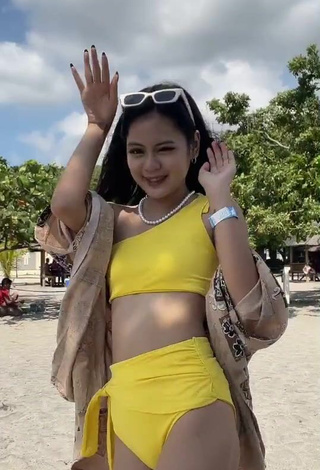 4. Titillating Eya Borja Shows Cleavage in Yellow Bikini