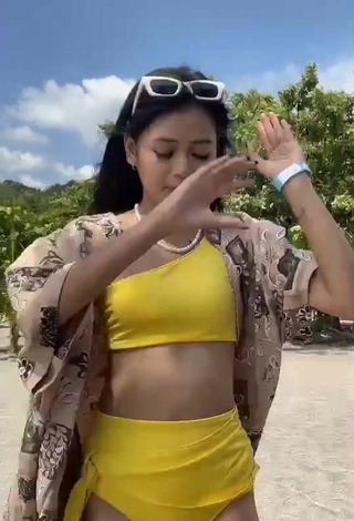 Sexy Eya Borja Shows Cleavage in Yellow Bikini