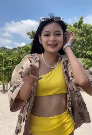 4. Sexy Eya Borja Shows Cleavage in Yellow Bikini