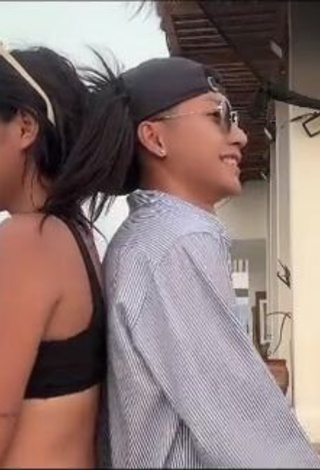 Beautiful Eya Borja Shows Cleavage in Sexy Black Bikini Top