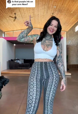 Alluring Heidi Lavon Shows Cleavage in Erotic White Crop Top