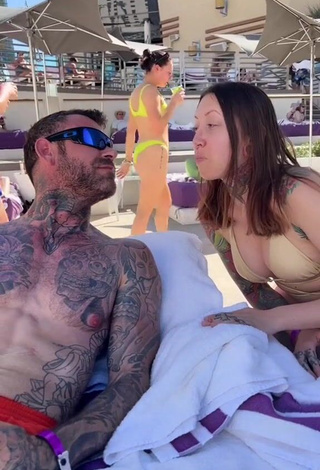 Sexy Heidi Lavon Shows Cleavage in Purple Bikini at the Pool