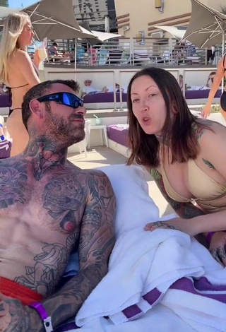 2. Sexy Heidi Lavon Shows Cleavage in Purple Bikini at the Pool