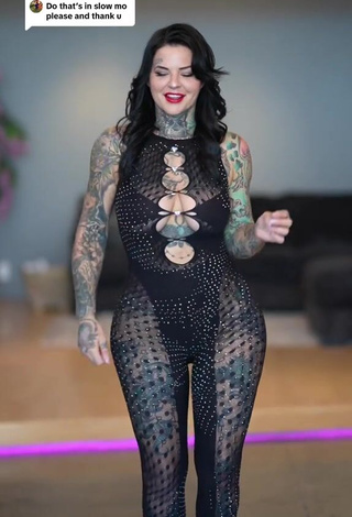 3. Luscious Heidi Lavon Shows Cleavage in Black Overall (Side Boob)