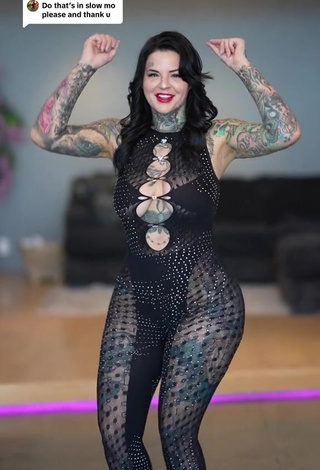 4. Luscious Heidi Lavon Shows Cleavage in Black Overall (Side Boob)