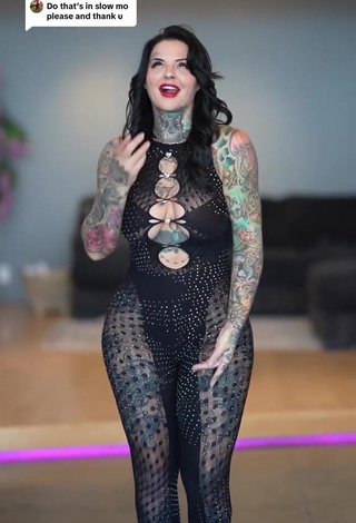 6. Luscious Heidi Lavon Shows Cleavage in Black Overall (Side Boob)