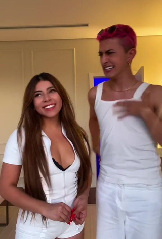 5. Titillating Ingrid Ohara Shows Cleavage in White Overall (Side Boob)