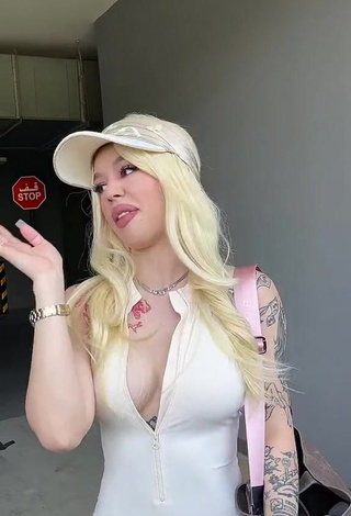 3. Hot Instasamka Shows Cleavage in White Overall (Side Boob)