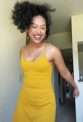 Sultry Kalia in Yellow Dress