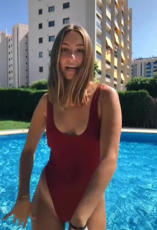 Titillating Laura Rodero in Red Swimsuit at the Swimming Pool