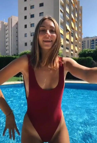 2. Titillating Laura Rodero in Red Swimsuit at the Swimming Pool