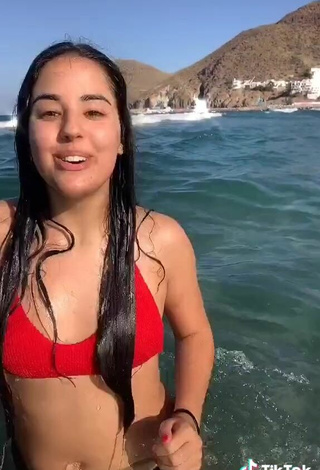 4. Luscious Laura López in Red Bikini Top in the Sea