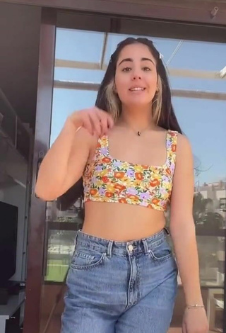 2. Luscious Laura López in Floral Crop Top