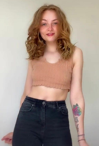 Titillating Leah Allington in Beige Crop Top